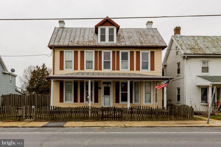 Beautiful Vintage Victorian with restored wood floors, original woodwork, doors and windows. Kitchen renovated updated and gorgeous! Possible first floor bedroom, plus 3 bedroom full bath and laundry upstairs.  3rd floor attic, could be finished for extra living space. Nice level fenced yard with barn (workshop) or could be converted to garage. Definitely a must see!