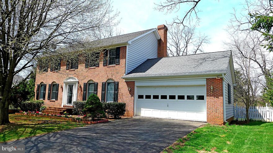 Pretty red brick colonial on a quiet street in Locust Hill--golf course a few blks away-school bus stops few feet away. Great lot with beautiful flowering trees backs to open field. Gleaming HW floors throughout (under carpet upstairs).4 BR, full finished bsmnt, Newer HVAC system.  ALL furniture conveys if desired by buyer. Well cared for home. Seller will pay closing costs. Motivated Seller!