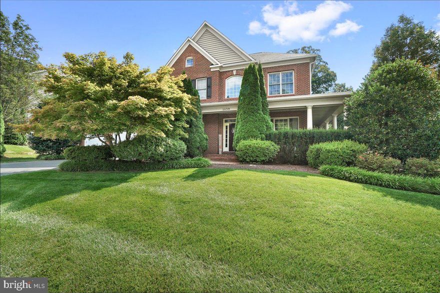 Former model with all of the available upgraded options and bump-outs! EXCELLENT condition and situated on a fantastic corner lot.  Almost 7000 sq ft of beautiful luxury living space with great attention to detail and superior craftsmanship throughout.  Gorgeous open floor plan that is perfectly designed for entertaining. Dream kitchen with granite and huge center island open to family room and bonus sun room option, butlers pantry, upper level laundry room, dual stairs, AMAZING finished basement with enormous custom bar, game room, theater room and large rec room,  2 fireplaces, stunning wrap-around porch,  custom paver patio with a fire pit and a built in BBQ Grill, incredible owner's suite and so much more. Photos are a must see! Clsoe to 70, 270, shopping and more. Urbana High School district!