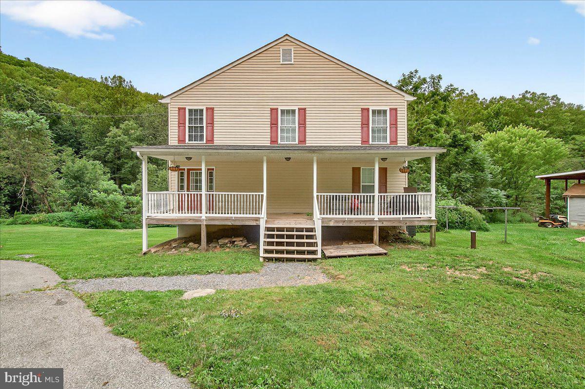 A gorgeous freshly painted, carpet, porch, newer roof and much more! Sit on your front porch as you relax and take in the beauty of the quiet Catoctin Mountains, and then walk into your open floorplan of a living room and kitchen with beautiful views. The unfinished basement is super clean and ready for a finishing. The property is tucked away but great for commuting as it's only 15 minutes North of Frederick, and USDA no money down eligible! The driveway is a half round making it easy for in and out that includes 20x20 parking pad enjoy satellite and new HVAC. Come see it today as it won't last long! Motivated sellers...