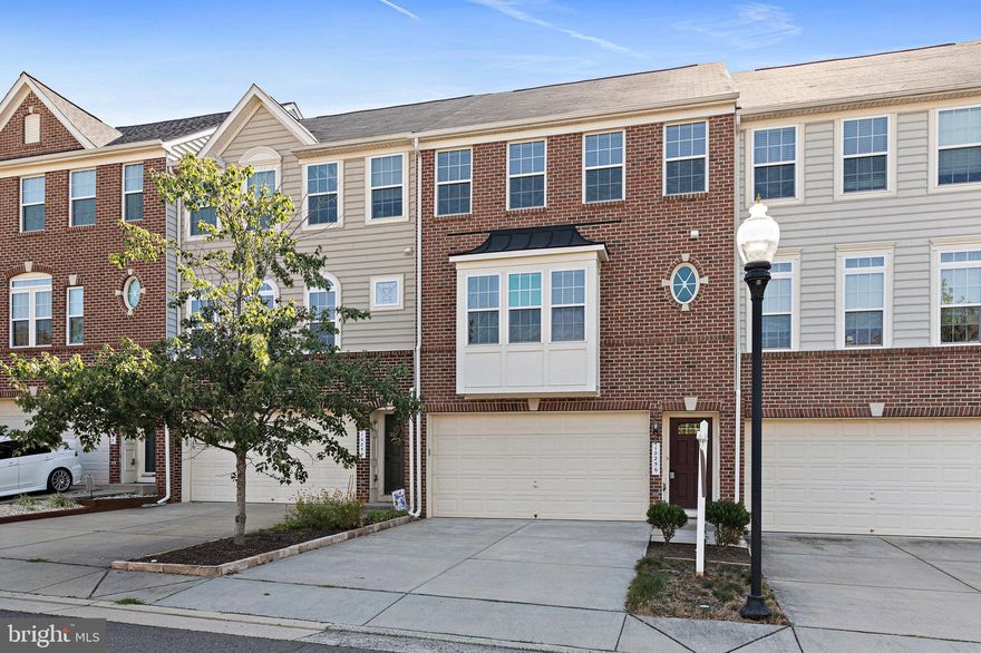 Lovely Brick Front Townhome.
3 bed, 2 Full & 2 Half Baths, 2 car garage. 
Spacious Kitchen with multiple recess lights, granite counters, SS appliances, adjoining dining area that walks out to the large, updated deck.
Large Family room with a ceiling fan and a Bay window bump out space.
Master bedroom with a ceiling fan, a master bath with a separate large tub and a shower.  
Basement  good sized recreation room, with a half bath, walks out to a well taken care of backyard.
2 Car Garage and a long driveway.  Plenty of visitor parking spaces.
Community has lots of open spaces, and is close to shopping centers, restaurants and schools.