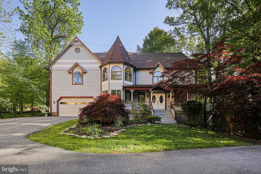 Welcome to this one-of-a-kind Victorian-style home, offering over 5,500 square feet of beautifully maintained living space with 5 spacious bedrooms and 3.5 baths. Set on one-third of an acre in Columbia’s Owen Brown Woods, this home is nestled on a quiet cul-de-sac surrounded by mature trees. Thoughtfully designed for both everyday living and entertaining, it’s a truly special find. The inviting front porch with a gazebo sets the stage for the home's classic style and character. Step into the grand two-story foyer and admire the beautifully refinished hardwood floors that extend throughout the bright and open main level. The formal living room features soaring ceilings and abundant natural light, creating a perfect place to relax and unwind. An arched entryway with columns leads you to the dining room, accented with crown and chair-rail moldings and French doors that open to a charming screened-in porch. The spacious kitchen features a center island with bar seating, abundant counter space, tile backsplash, and a sunny eat-in area with a bay window. A French door off the kitchen opens to the rear deck —perfect for summer dining and gatherings. The family room, with a 2-story ceiling, skylights, and a wood-burning fireplace, offers a welcoming space for relaxing evenings. Need a main-level bedroom? The full bath attached to the office adds flexibility and can easily serve as a guest suite. Upstairs, you will find stunning hardwood floors continuing throughout this level. The oversized primary suite is a true retreat, featuring cathedral ceilings, French door that open to a private upper deck, a spacious walk-in closet, and two additional oversized closets. The spa-like ensuite bath offers a skylight, 2 separate vanities, a soaking tub, and a separate standing shower. Convenience abounds with a dedicated laundry room on the upper level. Three additional bedrooms—including a light-filled, turret-style room—and another full bath complete this level. The expansive rec room in the lower level offers endless possibilities with space for a game room, home theater or gym. The lower level also has a half bath and extensive storage options, space for an additional bedroom, as well as walk-out access to the side yard. Located just minutes from shopping, restaurants, trails, the Hickory Ridge Village Center, the new Merriweather District and downtown Columbia, as well as commuting routes such as routes 29, 32, 100, and 95. PLUS no HOA or CPRA fees—this is the ideal place to call home! Recent upgrades: Roof (2016), chimney (2024), radon remediation system (2024), water heater (2020) and more.