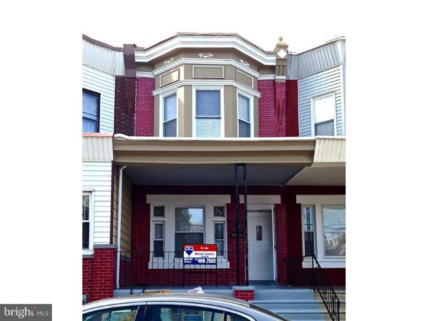 Incredible rehab with nothing left untouched. Huge house with 1 nice bathroom and two powder rooms, finished basement, Fireplace, incredible kitchen, rear yard and the list goes on. Not one to be missed and easy to show on lock box.