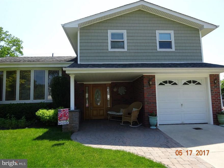 Location, location, location...check out this move-in ready, expanded split level in most desired Pine Valley neighborhood.  This property is distinguished both inside and out.  The main floor living space is an open floor plan with plenty of natural light, new neutral paint and hardwood floors.  This remodeled/redesigned eat-in kitchen includes lots of cabinet space, 5 burner gas stove, stainless steel appliances, and beautiful back splash. Lower level includes tiled foyer front entry way, powder room, laundry room with washer, dryer, utility sink, counter top and shelving. Also on this level is the Family room with remote controlled gas fireplace and home office with sliding glass doors that open to an expansive and bright multi-use sun room with Bose sound system/speakers, making it a great entertainment space. Upper level of this house starts with an open landing, Master Suite, including walk-in closet and master bath,two additional good sized bedrooms and hallway full bath complete this level.  Other desired features include: Pella windows, doors and blinds, 200 Amps Electric Service, EP Henry front and side walkways and patio, beautifully landscaped front and backyards with storage shed.  Schedule your appointment today and make this fabulous house your next home!