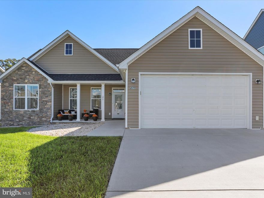 Step into contemporary comfort with this stunning, 4-year-old rancher, featuring 3 bedrooms, 2 full bathrooms, and a host of modern amenities. The home boasts an appealing partial stone front and a spacious open floor plan that enhances the flow and functionality of the living spaces. Inside, you'll find a stylish kitchen equipped with a center island, granite countertops, and stainless steel appliances, perfect for everyday meals and entertaining. Cathedral ceilings throughout the main living areas create a bright and airy atmosphere, while the primary suite offers a touch of luxury with its tray ceiling, private bathroom, and ample walk-in closet.  Outdoor living is just as impressive, with a large 14x26 patio situated within a fenced yard, providing a secure and private setting for relaxation and gatherings. An additional shed offers convenient storage for tools and outdoor equipment.  Located close to major highways, shopping, restaurants, and more, this home combines the tranquility of suburban living with the convenience of access to urban amenities.