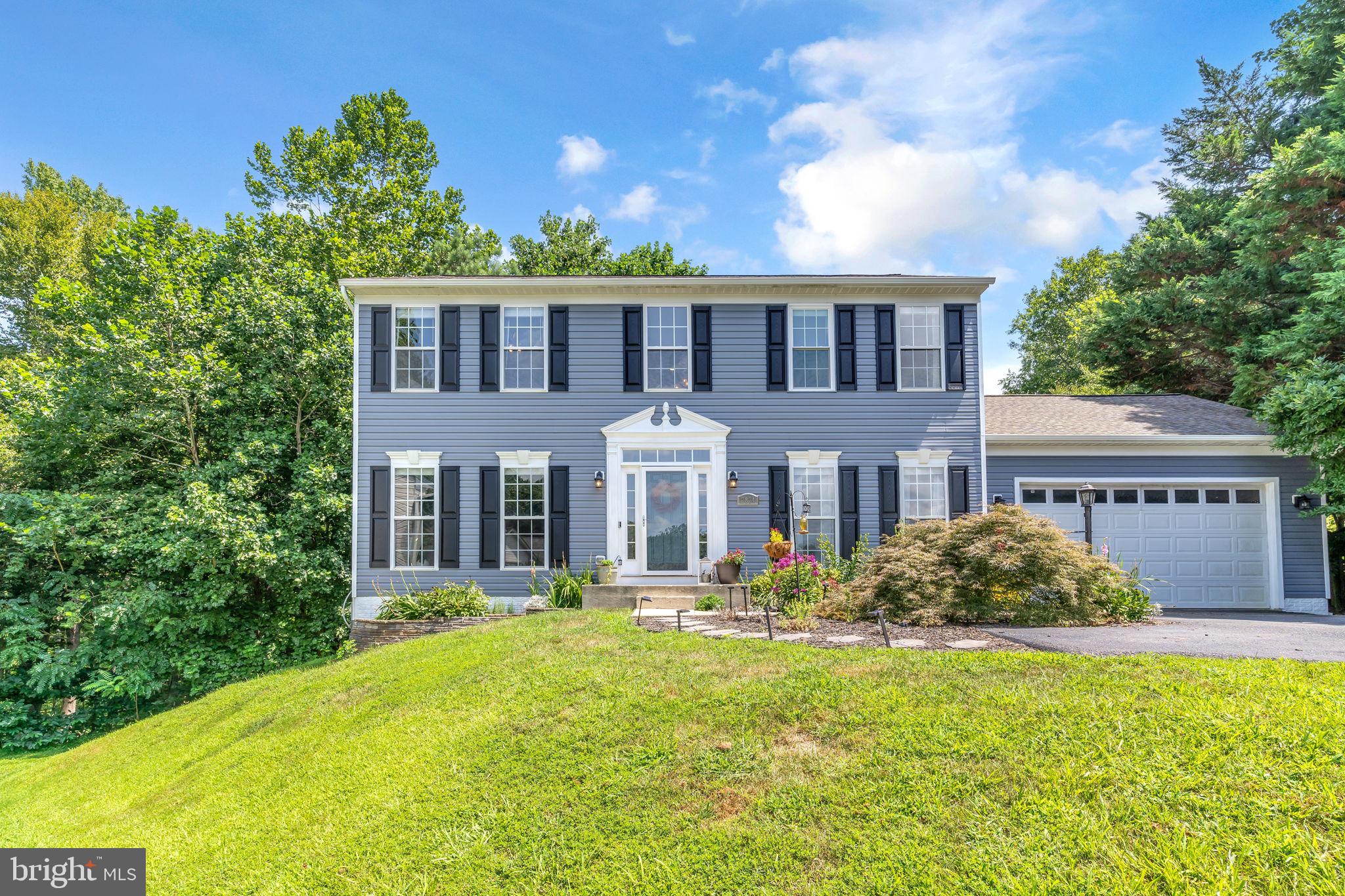 **3.125% VA ASSUMABLE LOAN**
Welcome to 7874 Eagle View Drive — a beautifully updated colonial in sought-after Richfield Station! Step into a home that blends modern convenience with timeless style. The spacious kitchen is a chef’s dream with newer appliances (2022–2023), 42” high countertops, a pot filler over the stove, two pantries, and an expanded dining area that flows seamlessly to the back deck — perfect for entertaining.
Upstairs, the primary suite features double-door entry, a separate soaking tub, glass-enclosed shower, and Alexa-integrated fan and recessed lighting for a spa-like experience. Hall bathroom includes stylish touches like honeycomb tile flooring and a built-in hanging rack.
Throughout the home, enjoy new light fixtures, new carpet in the upper and lower levels, and elegant crown molding on the main level. One room is currently used as an office and features a built-in wall shelf for added character. There is also a Nest thermostat and heat sensors on each floor and in bedrooms to help regulate temperatures with smart technology.
Major upgrades offer peace of mind: roof replaced 2019–2020, brand new siding and shutters, new storm door, new grinder pump, new gutters and downspouts, and regular HVAC & water heater maintenance.
The garage is a standout with epoxy floors, a plank wood accent wall, and added storage potential. The basement includes a rough-in (located to the left of the staircase) for future customization.
This home has been lovingly maintained and thoughtfully upgraded — ready for you to move in and enjoy!