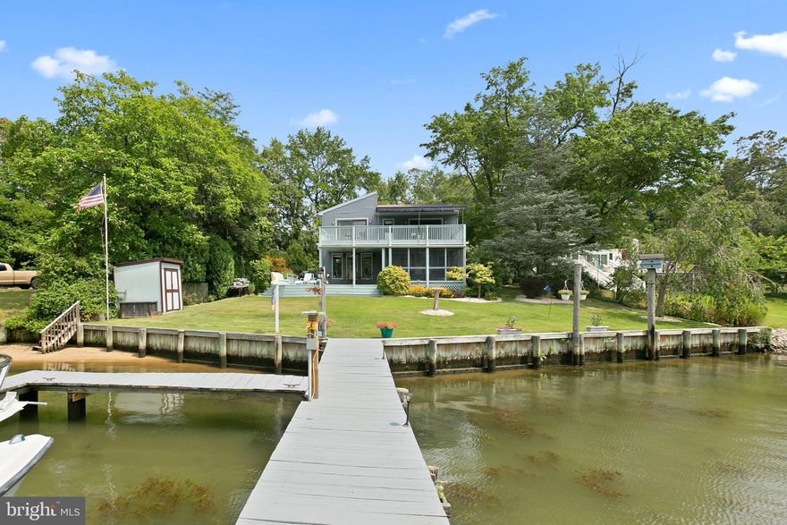 Fantastic sheltered waterfront home on beautiful Norman Creek - two boat slips with water and electric   -Easy access off of 702, close to amenities and services  - Great Cape May Manor location -  Numerous  updates in the past several years;  New  flooring,  LED lighting, all 3 Bathrooms, siding, soffits, gutters - waterproofing/French Drain - and so much more!   The house was built in 1985,   a portion of which was built on the original 1929 foundation, providing lots of dry storage.    -  No Flood insurance required!  Make your appointment to see this gorgeous property in person.  This Property is being offer for sale AS-IS .