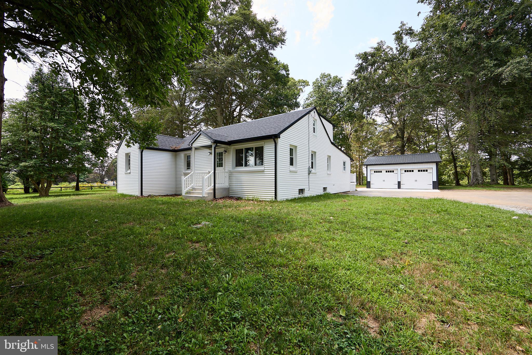 Completely Renovated 5-Bedroom, 3-Bath Cape Cod on 2.4 Acres! This stunning home has been updated from top to bottom with modern finishes while preserving classic charm. Nestled on a beautifully landscaped 2.4-acre lot, the property offers space, privacy, and endless possibilities. Step inside to discover a fully renovated interior—every room has been refreshed, from the floors to the ceilings. With 5 spacious bedrooms and 3 full baths, there’s plenty of room for family, and guests. Outside, enjoy the massive, covered deck overlooking the back yard or the huge, detached garage—perfect for vehicles, a workshop, or both! The expansive backyard feels like your own private park, ideal for entertaining, gardening, or simply relaxing in nature. A must-see to truly appreciate the care and quality that went into this transformation. Come fall in love with your next home!