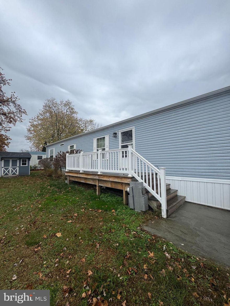 Welcome Home to 5057 Grace Drive! This newer Eagle River single wide home offers a custom kitchen with upgraded stainless steel appliances, two private bedrooms one on each end of the home, one full bathroom, a powder room and a small deck in the front of the home. Perfect for easy living with a cozy layout with low maintenance! 
There is an application process that needs to be completed through Pennwood Crossing before an offer can be considered. You can go in person to the office or on the website.