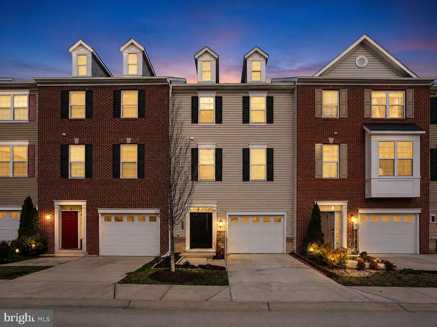 Rarely available and truly move-in ready, this spacious Morris Place garage townhome offers approximately 2,400 square feet of modern, flexible living space in a convenient Howard County location. Built in 2018 and beautifully maintained, the home has been refreshed with fresh paint, brand-new carpet, and a new stove, giving buyers a clean, updated feel from the moment they walk in.

The main level features a bright, open-concept layout with generous living and dining areas, large windows, and a well-appointed kitchen with bar seating, ample cabinetry, and great everyday functionality. Upstairs, you’ll find three spacious bedrooms, two full bathrooms, and a convenient laundry closet, including a large primary suite with a walk-in closet and ensuite bath with dual sinks.

The finished lower level adds valuable flexibility with a full bathroom, walkout access, and space that can easily serve as a guest suite, home office, gym, playroom, or second living area. One of the home’s most unique features is its setting directly in front of the community dog park, offering a rare lifestyle perk for pet owners and a sense of open space right outside your door.

Morris Place also offers playgrounds, picnic areas, walking and jogging paths, and ample parking for residents and guests. Ideally located near Columbia, Ellicott City, major commuter routes, parks, shopping, dining, and everyday conveniences, this home delivers the space, condition, and location today’s buyers are looking for, without the wait.