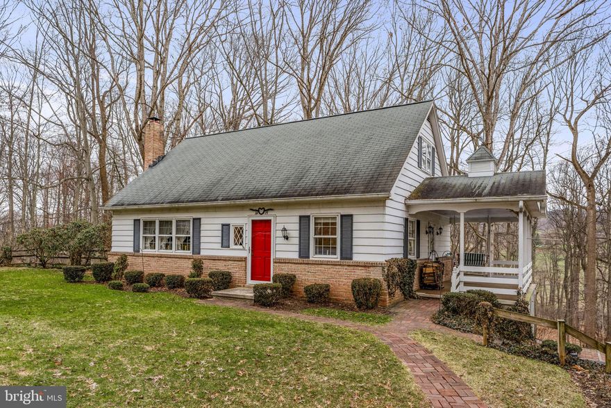 One‑owner 1½‑story country home with 2,040 SF of finished living area on a 3.25‑acre wooded lot. Features include oak hardwood floors in the dining and living rooms, an updated kitchen with modern appliances, and a first‑floor bedroom and bath. Living Room with brick fireplace. The daylight basement offers a family room for additional living space. Property includes a 15×13 workshop with workbench, an oversized 1‑car garage and carport, and multiple outbuildings/utility buildings suitable for storage, hobbies, or playhouse use. Convenient location just minutes to Denver, Adamstown, Sinking Spring, and surrounding areas. Inclusions: All kitchen appliances, washer, dryer, porch swing, log holder, basement rugs, table and chair. Side porch includes roll‑down snow screens; plastic panels for the carport (stored in garage) are included for winter weather protection. *** Offer deadline set for Tuesday, March 31 @ 4PM.  Highest and best.  No escalation clauses*******