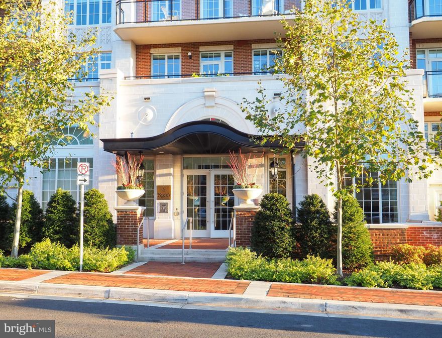 Welcome to The Signet, luxury at it's finest! This fabulously open two bedroom condo has one of the most expansive terraces at 490 sq. ft. with Pergola and lovely views! Beautifully located steps from the elevator that takes you to the Lobby with full service 24 hour concierge or parking garage to the 2 dedicated parkings spaces. The Foyer and Entry Hallway lead to the living area with wall of windows that opens to the terrace. There is a gorgeous Chef's Kitchen with enormous Island, top-of-the-line appliances, custom cabinets and designer backsplash that opens to the Dining and Living areas. The Owner's Bedroom has a Spa like bath with shower, oversized soaking tub, vanity with double sinks and private water closet. There is also a large walk-in closet and French doors with private entrance to the terrace with Pergola. There is also a generous en suite second Bedroom, Powder Room and Laundry Room. No detail is overlooked the Signet has a Club Room with catering Kitchen, Courtyard with tranquil, elegantly landscaped gardens and fountains, fire pit, covered barbecue/bar area for entertaining and private park! The other standout features are a fitness center with sauna, steam room, massage room and yoga room. Not to be overlooked there is a pet washing station for your furry friends. Conveniently located in downtown McLean an easy walk to restaurants, grocery stores, and shopping.