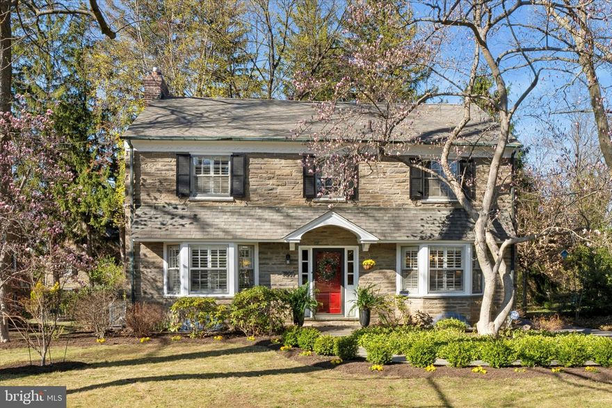 Welcome to 7809 Knox Road in the very desirable, quaint, and friendly neighborhood of Laverock! This solid-built stone and brick facade Center Hall Colonial exudes charm and character and is located on a quiet tree-lined street. The newly pointed flagstone walkway (2025) which is surrounded by mature perennial plantings and gorgeous flowering trees leads you to this magnificent home. Once inside, you will be greeted by the spacious foyer boasting hardwood floors that continue throughout the home. The formal living room showcases a beautiful stone wood-burning fireplace and a large sun-filled bay window with plantation shutters. Adjacent to the living room via the large sliding glass door is a gorgeous custom screened-in porch that was erected (2017) which showcases 4 skylights and a large ceiling fan, making this a cool, private retreat. The porch was constructed using pet screening for added durability. 
If you love to cook and entertain, the spacious gourmet kitchen is a chef’s dream! The enormous 10 ft. long kitchen island features a granite countertop, a prep sink, and plenty of cabinet and drawer space and bar seating. The cabinets extend throughout the entire kitchen with soft-close features along with under-cabinet lighting for added convenience. The counter space is abundant and boasts granite countertops, a farmhouse sink, stainless steel appliances, pendant and recessed lighting, and a tile backsplash. Completing the kitchen is a cozy sun-filled dining nook with a bay window seat, an office workstation, bamboo flooring, classic wainscoting and plantation shutters. Immediately off the kitchen, you will find the convenience of a mud and laundry room combination providing easy access to the driveway. Completing the main level is the tucked-away powder room and a hall coat closet.
Ascending to the second level, you encounter the spacious Owner's Suite featuring an en-suite bathroom with a walk-in shower. The Owner’s Suite also features plantation shutters and two good-sized closets of which one is a walk-in. Completing this level are two additional large bedrooms with plentiful closet space, a hall bathroom with linen closet, and two additional landing closets.  
The massive unfinished walk-out basement offers tremendous possibilities for expanding living space or recreational needs, with windows that bring in natural light.  
The backyard is an outdoor enthusiast's retreat, offering a wonderful space for gatherings and entertainment. You will enjoy the lovely mature lush gardens and flowering trees - truly a gardener's haven! In the summer, the gardens are overflowing with native perennial plants. The yard is a NWF Certified Wildlife Habitat (2023). The beautiful hardscape patio was added in (2021). The back yard is surrounded by a low maintenance aluminum fence with the exterior patio area conveniently accessible to the screened-in porch. A Tuff Shed was added in (2021) for all your gardening projects. The long driveway leads to the two-car detached garage. Noteworthy projects that were completed this year (2025) include professional soft washing of all exterior surfaces and painting of outside and some interior areas of this lovely home. High Velocity AC was installed throughout (2020) and a new water heater(2023).
The location is ideally suited for convenient access to shops and restaurants of Chestnut Hill, Center City Philadelphia, and Rtes. 309 and PA Turnpike, the charming community of Glenside and the Keswick Theater, the Philadelphia Cricket Club, La Salle College High School, Germantown Academy, Springside Chestnut Hill Academy, Ancillae-Assumpt Academy and nearby Septa stations. Come visit and fall in love!!