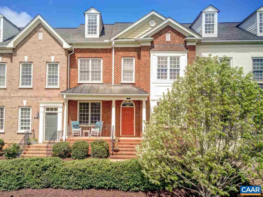 Rare opportunity to own spacious, elegant, upgraded town home with 2 car garage on the Common in Old Trail!! New HVAC in 2022. One of a kind floor plan with living room, dining room, kitchen with breakfast bar, pantry, and gas range, large sun room adjoining kitchen and family room. Stainless kitchen appliances including a new refrigerator and dishwasher. You'll love the gas fireplace flanked by custom cherry built-ins in family room.  Upstairs includes the spacious owner?s suite with 2 walk in closets and large attached bath with large soaking tub and shower and 2 additional bedrooms, full bath and laundry area with new washer. Fenced back yard and detached 2 car garage with storage too!,Granite Counter,White Cabinets,Wood Cabinets,Fireplace in Great Room