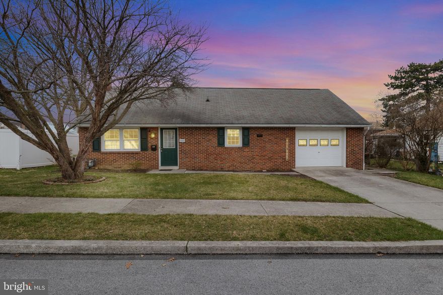 Come check out this solid brick rancher in Hanover Borough! This one owner home is situated on a nice flat lot on a charming street just a short walk away from Moul Field and the Hanover Trolley Trail. There are four total bedrooms and two bathrooms, with two bedrooms and a full bathroom on the main level, and two more bedrooms and a half bath upstairs. The basement is full footprint and has walkout steps to the large backyard that's just waiting for your summer garden. The detached garage in the backyard has a block foundation and poured concrete floor, making it a great place for a work shop, storage, etc., while the attached garage means your car (and your groceries!) will be safe from snow and rain.