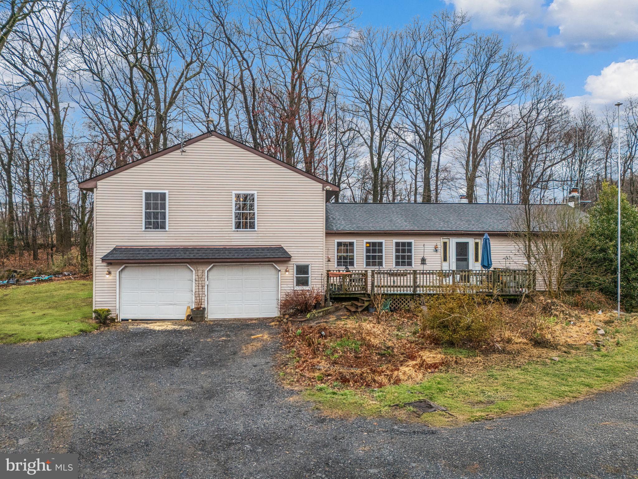 Nestled in the tranquil countryside of Alburtis, Pennsylvania, 552 Baldy Hill Road presents a charming split-level home offering a peaceful retreat on a generous 2-acre lot. Surrounded by picturesque farmland, this property embodies rural living at its finest, providing a sense of space and serenity. The home features four bedrooms, two full bathrooms, and a powder room, offering comfortable accommodation. Adding to its versatility, there's the potential to easily close off a section of the house to create a convenient in-law suite, complete with its own private living area and bathroom, while still allowing for shared access to the main kitchen. With its split-level design and ample outdoor space, this residence presents a wonderful opportunity to embrace a relaxed lifestyle in a beautiful, pastoral setting, with the added benefit of flexible living arrangements.