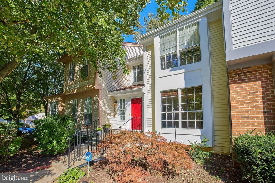 Rare opportunity to own an updated and improved layout in Tivoli. Contemporary stylings are noted as you enter the home thanks to the 2-story foyer with a large window above the door, a skylight and cool wood stair rails. This floor plan, enhanced by a previous owner, was opened up on the main level -- the interior kitchen wall was removed and the kitchen expanded with a long countertop opening the space to the family room with an updated marble-surround wood-burning fireplace with mantle. This flexible space also offers clever, built-ins on the other side of the kitchen peninsula and in the dining room (a great serving space for bowls and platters!). There's also a charming wood frame, slim glass door to the deck, allowing extra light in and a nice space outside to relax, enjoy a meal or morning coffee. There are hardwoods throughout the main level. Upstairs, the generous primary bedroom en suite boasts a cathedral ceiling, adjacent full bathroom and small dressing area with ample closets. The bump-out window in this room is a charming touch. The walkout lower level has been freshly painted, the carpet is brand new and the half bathroom has been updated. The ample laundry room offers great storage, an extra freezer and workbench area and the spacious family room at the back of the house offers built-in shelves and a sliding door to the flagstone patio and fenced yard which backs to a treed area allowing for some nice privacy! Enjoy the Tivoli Community Center with a fitness area, playground and clubhouse. Glenmont Metro, Brookside Gardens and Nature Center, the Wheaton Park Stables and Wheaton Regional Park are all only minutes away. While well maintained, this property conveys strictly as “AS-IS”. Thank you for your interest in this property -- any offers will be presented late Thurs, 11/02 (deadline is Noon).