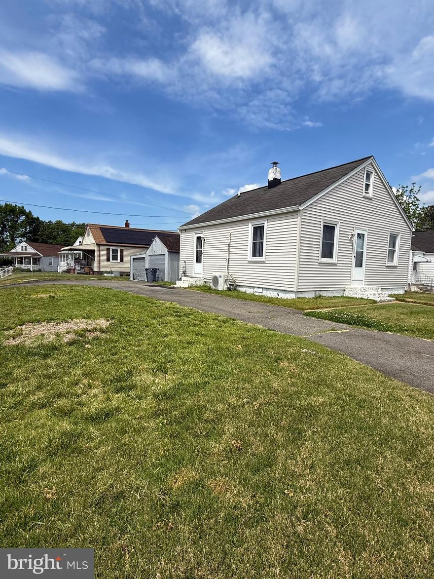 JUST LISTED!!  Dundalk 3 bedroom, 1 full bath Cape Cod.   Home is small but very affordable.  New siding installed 2 years ago, new front & side storm doors,  completely remodeled bath.  Home has hardwood flooring, tile, carpet & plank.   Kitchen has been remodeled and has refrigerator, stove Washer & Dryer.  There is a mini split heat pump for a/c and heat.  Yard is completely fenced and lots of parking.  Garage is 
"as is".  It can be torn down for more parking, remodeled or rebuilt.  Washer & dryer are currently in bedroom.