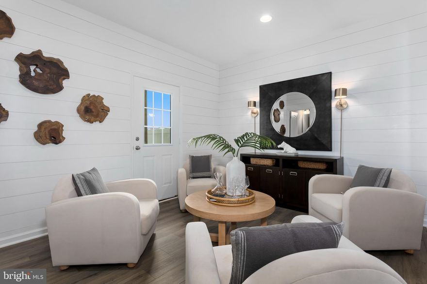 *OFFERING UP TO 18K INCENTIVE  FOR PRIMARY RESIDENCE WITH USE OF PREFERRED LENDER AND TITLE.  CONTACT CO LISTING AGENT/CONSULTANT FOR DETAILS*  
May Delivery in Berkeley County’s premier planned community featuring a clubhouse, swimming pools, walking trails, lush landscaping and mountain views. The Bedford II, 3 level townhome features a box bay window with  a 1 car garage. This home features 3 Bedrooms and 3.5 Baths. It is fully finished top to bottom. The front door leads directly into the spacious lower level including 9 ft. ceilings, foyer with a double coat closet, and access to the garage with a garage door opener. Continuing into the fully finished lower-level recreation room, complete  with a full bath and walkout access to the rear yard with privacy fencing. Open concept main level with 9 ft. ceilings, luxury vinyl plank flooring throughout this level, dining room, and kitchen. The kitchen has stainless steel appliances, a large 8’ plus island, Mission style white cabinets, Blanco maple quartz countertops, and a boxed bay window at the rear. The kitchen leads directly into the living room with powder room. The primary suite includes a large walk-in closet, and the primary bathroom has dual vanities with tiled shower with a seat. The laundry is located on the bedroom level. Home and community information, including pricing, included features, terms, conditions, availability and sales procedures related to appointments subject to change without notice. All images are for illustrative purposes only and individual homes, amenities, features, and views may differ. Images may be subject to copyright.