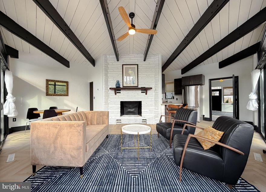 Come see today and enjoy your own private retreat with Chesapeake Bay beach access so close. Level lot with large patio and outdoor kitchen area for all your fall entertaining. Wonderfully, lovingly restored to a very cool place to "hang your hat" and relax. New well, new septic so no worries! 2 bedrooms, 1 bath, Great room with fireplace. Separate laundry room. Family room or flex space to use as you need. Maybe a home gym, maybe an office maybe as another bedroom or maybe a pool hall! The possibilities are endless. Enjoy 2026 with a beach access home  with outdoor kitchen area and patio for all the fun to come!