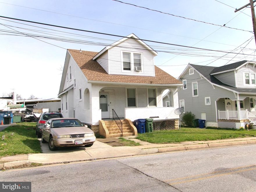 Large Well Maintained 2 Apartment Home that can Easily be Converted back to a Single Family Home. Live in One and Rent the Other to Help Pay your Mortgage!  2nd Floor offers 1 Bedroom, Large Closets, Full Kitchen and Bath. New Tub Enclosure and Floor in Bath, New Kitchen Floor, Living Room and Large Storage room.   1st Floor features New Floors and New Carpet, Large Closets in every room (Some Walk In), French Doors between Living Room and Dining Room, Foyer,  Full Unfinished Lower Level,  Covered Front Porch, Side Entrance and Driveway.  Separate Meters. Zoned. Must See!  If possible prefer to use  Cardinal Title Group.