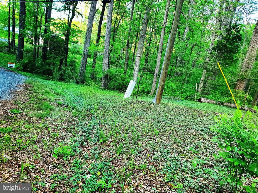 Opportunity to BUILD on this 1.08 acre  (Lot 34 and Lot 33).    Located in Hidden Lake community with view of the lake, and stream running behind property.  Copy of drain field site evaluation available. Existing shed on property is As Is (located on Lot 34) and Lot 33 is vacant.  Use caution when viewing  and call with any questions.