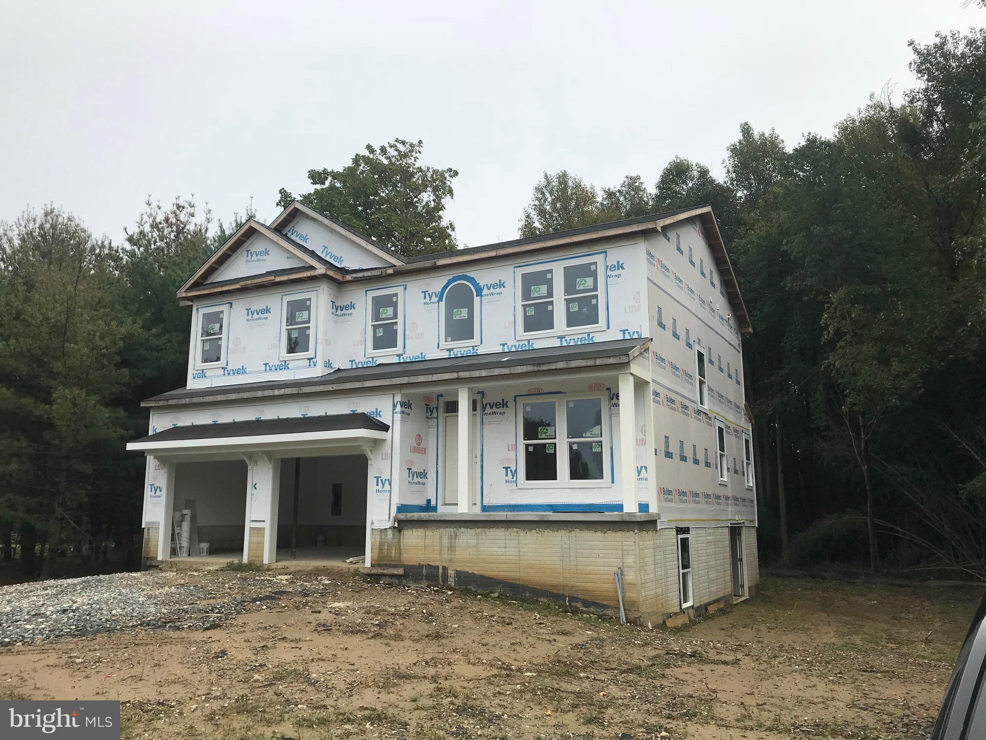 NEW CONSTRUCTION. Oversized Colonial on a secluded 2/3 acre lot. This home features 4 large bedrooms, 2.5 baths, and 2-car garage. Numerous upgrades include Granite Counters, Hardwood Floors, Kitchen Island, Sunroom Extension, Stainless Steel Appliances, Gas Fireplace, Oversized Master Walk-in closet, and tiled bathrooms. Short walk to the water. Or enjoy the crisp Bay breeze from the front porch.