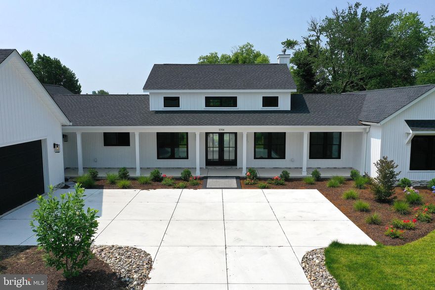 Brand New Waterfront Construction, overlooking Turville Creek, with NO HOA!  This 4 bedroom 2 1/2 bathroom, one story Coastal Home, built by Piney Island Builders,  was just completed and is ready for you to move in!  

Tons of natural light throughout the entire home!  Gorgeous kitchen with quartz countertops, dove tailed soft close cabinets and drawers, stainlesss GE Cafe Appliances, including a gas stove, and a stainless farm style sink. 

Thoughtful touches everywhere, such as floating shelves on either side of the gas fireplace and in the second full bathroom.  A full utility room, with top of the line front load washer and dryer, a sink and direct access to the backyard.  Mud room area, with private entrance or from  the garage for convenient drop off of bookbags, purses, shoes, briefcases and coats!  Workspace or bar area just off the kitchen for whatever fits your needs.  There are so many possibilities to have this home suit you and your family!

Slider to the back paved patio with not one but two outdoor fans to cool you off as you take in the breathtaking waterviews and enjoy the landscape. See documents for proposed pool site, specific selections and pier plans.