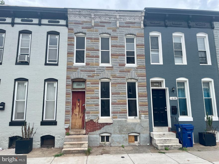 Ready for renovation. Close to Johns Hopkins Hospital, shopping, and major commuter routes.