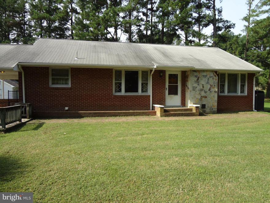 All Brick Rambler with full basement, garage and two large sheds. 1.75 acre level lot, just off Rt 610.Fully fenced, hardwood floors throughout first floor, walk up attic, washer and dryer. Plumbed for dishwasher. Also has two car carport. Being sold AS IS. Great for 203k or handyman.
