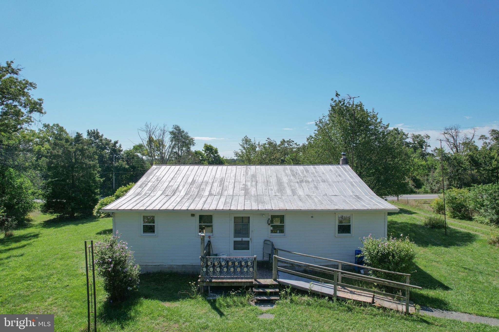 BACK TO ACTIVE...(Pending Release- no fault of seller.) This 3.24 ACRE private parcel is a great start to your own quiet, country retreat! Settled along Apple Harvest Drive at the base of a gorgeous mountain ridge, this 3BR/ 1 BA sets the stage for a beautiful view and plenty of space to set up your favored lifestyle. There are many outbuildings prime with opportunity and a massive workshop and storage set up in the basement. You will love the area; set up your showing appointment today!