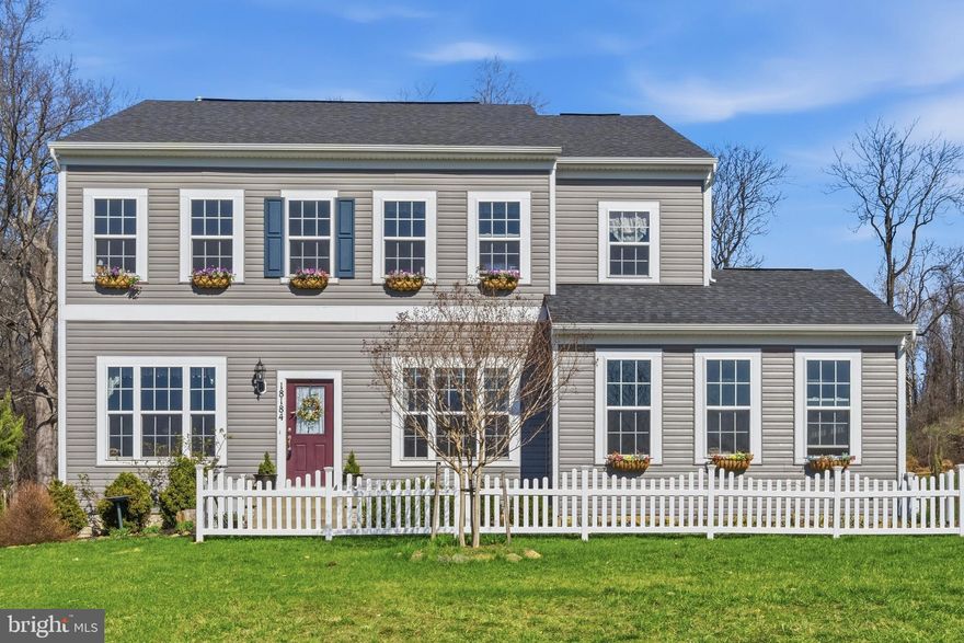 Built in 2019, the home's modern, open layout is designed for everyday living. A light-filled kitchen with upgraded countertops and a large center island flows naturally into the main living area and out to the deck — a seamless indoor-outdoor connection that feels right for the setting.
Four bedrooms sit upstairs, while the fully finished walk-out basement adds a fifth bedroom and full bath — flexible space for guests, a home office, or whatever you need most.

Additional features include a whole-home water filtration system and a battery backup sump pump — the kind of details that matter when you're settling into a property with this much land.
Conveniently located near Sleeter Lake and the town of Round Hill, with easy access to Purcellville and the broader Loudoun County amenities. A newer home with rare acreage — and the space to make it entirely your own.

Cleared, usable acreage like this is becoming genuinely hard to find in Loudoun County. Here, approximately 3.5 acres of open land extend behind a move-in ready home — giving you not just a place to live, but the space to shape it into exactly what you want. Whether that's a pool, an outdoor kitchen, a garden, or simply room to breathe, the canvas is yours.
The setting feels private and open while still being part of an established, welcoming community.

Additional features include a whole-home water filtration system and a battery backup sump pump — the kind of details that matter when you're settling into a property with this much land.
Conveniently located near Sleeter Lake and the town of Round Hill, with easy access to Purcellville and the broader Loudoun County amenities. A newer home with rare acreage — and the space to make it entirely your own.