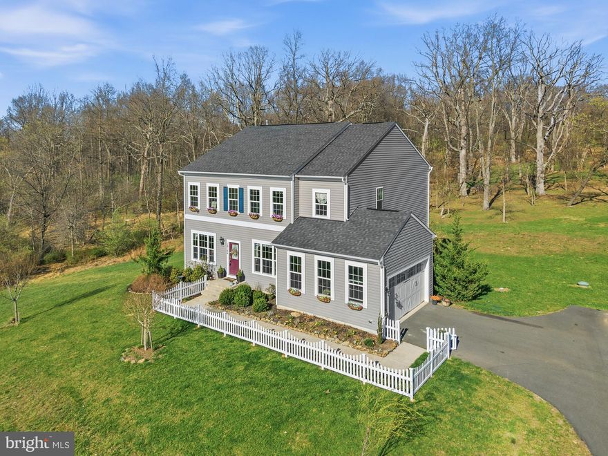 The Yard You Can’t Manufacture.
In Loudoun County, 4.55 acres isn’t just a lot size; it’s a lifestyle change. Most listings talk about "potential," but 18184 Presidio Place offers the kind of privacy and scale you usually have to drive much further west to find.
Situated in the Bluffs at Sleeter Lake, this is the one buyers' bookmark. It’s for the person who wants the community of Round Hill but needs more breathing room than anyone else on the street.
The Land is the Hero. With 3.5 mostly cleared acres, the "backyard" is actually a private park. It’s a blank canvas for the things that make life better: a pool that feels like a resort, a professional outdoor kitchen, a massive garden, or just enough space for a Saturday afternoon where you don't hear anything but the wind. Here, holidays move outdoors, and summer thrives on the brand-new deck.
Modern Living, Zero Homework. While the land is the draw, the house is the perfect partner. Built in 2019, this 5-bedroom, 3.5-bath home is "move-in ready" in the truest sense.

The Heart of the Home: A light-filled kitchen featuring upgraded counters, a massive entertaining island, and a family room layout that flows naturally to the outdoors.
Space for Everyone: Four generous bedrooms upstairs, plus a fully finished walk-out basement with a fifth bedroom and full bath—ideal for guests, a multi-gen setup, or a quiet home office.
Peace of Mind: Thoughtful upgrades like a whole-home water filtration system and battery-backup sump pump mean the "un-sexy" details are already handled.
You get the proximity to Sleeter Lake and the quiet, intentional pace of Round Hill life, paired with the rare luxury of four and a half acres to call your own.
Acreage. Privacy. Room to breathe. Come see why this is the one you’ve been waiting for.