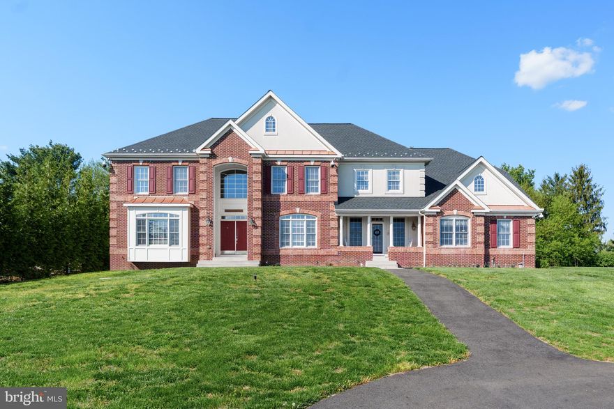 There’s no place like home! Welcome to 26 Rock Hollow Ct in The Reserve at Elk River, offering privacy, space, and exceptional amenities while remaining conveniently close to downtown North East for local shops and dining, as well as nearby commuter routes. A grand two-story entry with curved hardwood staircase sets the tone, leading to formal living and dining spaces, a private office, and a family room with vaulted ceilings and a brick wood-burning fireplace. The gourmet kitchen features granite countertops, abundant cabinetry, a gas cooktop, double wall ovens, and new refrigerator and dishwasher (2025), opening to a bright sunroom overlooking the backyard retreat. An additional entrance leads to a convenient mudroom and laundry area with access to the oversized 3-car garage, along with a secondary staircase providing direct access to the upper level. The upper level includes a spacious primary suite with sitting area, propane fireplace, dual walk-in closets, and a beautifully updated primary bath (2026). A private ensuite bedroom and two additional bedrooms connected by a full bathroom complete the level. The finished lower level adds flexibility with recreation space, theater room, full bath, and a newly added second kitchen, ideal for extended living or entertaining, plus walk-out access to the backyard. Additional unfinished areas provide ample storage and utility space with potential for future expansion. Outside, relax or entertain with a heated gunite in-ground pool and spa (2018) with waterfalls, lighting, and swim-outs, complemented by a paver patio and composite deck with vinyl railings. Major recent improvements include a new roof (2025) and new HVAC system (2025). Additional highlights include epoxy flooring in the garage and an expanded circular driveway. Residents enjoy access to the community’s private Elk River beach for easy waterfront enjoyment close to home. Schedule your private tour today and experience everything this property has to offer!