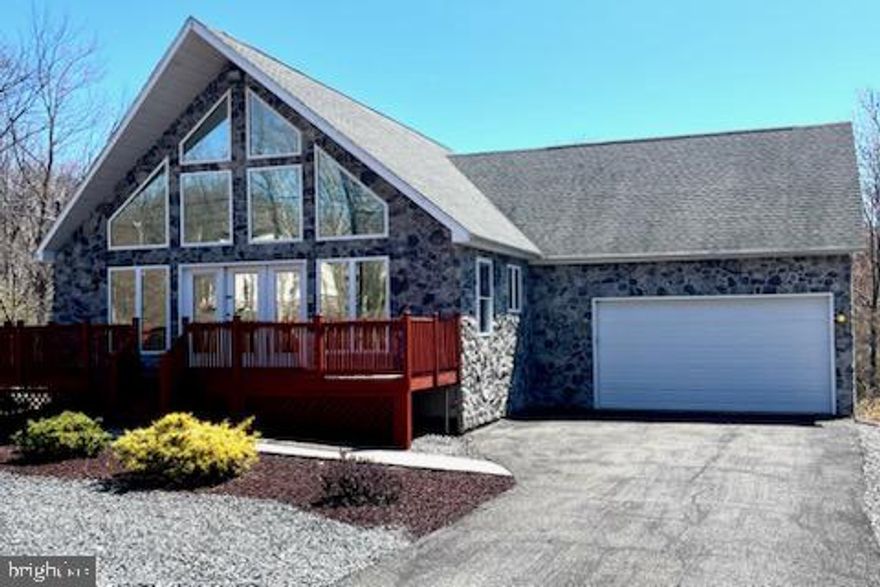 Welcome to 33 E Players Way, nestled in the heart of the highly desirable Eagle Rock Resort community in Hazleton, PA! This beautifully designed 2-bedroom, 2.5-bath home is located in the Hazleton School District and offers the perfect blend of modern comfort and inviting charm. Step inside to find a bright, open living room featuring stunning floor-to-ceiling windows and warm wood flooring that fills the space with natural light. The kitchen, accented by rich wood finishes, flows seamlessly into a separate dining area—ideal for both everyday meals and entertaining. Upstairs, a versatile loft area provides the perfect dedicated office space, a cozy reading nook, or even a guest overflow area. The generously sized primary bedroom serves as a peaceful retreat, offering plenty of room for relaxation and comfort. Additional features include a concrete, spacious basement perfect for storage or future finishing, and an attached garage providing added convenience and functionality. Living in Eagle Rock means access to an incredible array of amenities—you’ll never be bored! Enjoy golf courses, skiing, lakes, swimming pools, equestrian facilities, hiking trails, a spa, clubhouse, and so much more, all just steps from your door. Whether you're seeking a year-round residence or a vacation getaway, this community has something for everyone. Don’t miss the opportunity to own a stylish, move-in-ready home in one of Hazleton’s premier locations. Schedule your private showing today and come experience all that 33 E Players Way and Eagle Rock Resort have to offer!