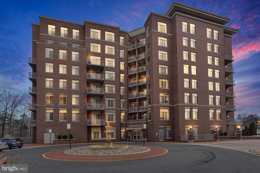 Beautiful corner unit at Elan at East Market across from Whole Foods. You'll have everything you need to live your best life here! Perfectly designed kitchen that makes cooking your favorite meals a breeze. Gourmet kitchen with granite countertops, stainless steel appliances and breakfast bar open to living room. Oversize windows. Two Master Bedrooms with full bathrooms. Great view from balcony, enjoy spectacular sunsets overlooking a majestic area with mature trees while drinking your morning coffee. HVAC (2022). Two secure garage parking spaces. Choose among myriad entertainment, dining and shopping options, and enjoy the convenience of onsite fitness, party room, two level pool, tennis court, and business center. Water and gas included in condo fee. This unbeatable location also offers a shuttle to metro, plus fast access to I-66, Dulles, Fairfax County Parkway, Rt 50 and Rt 29.