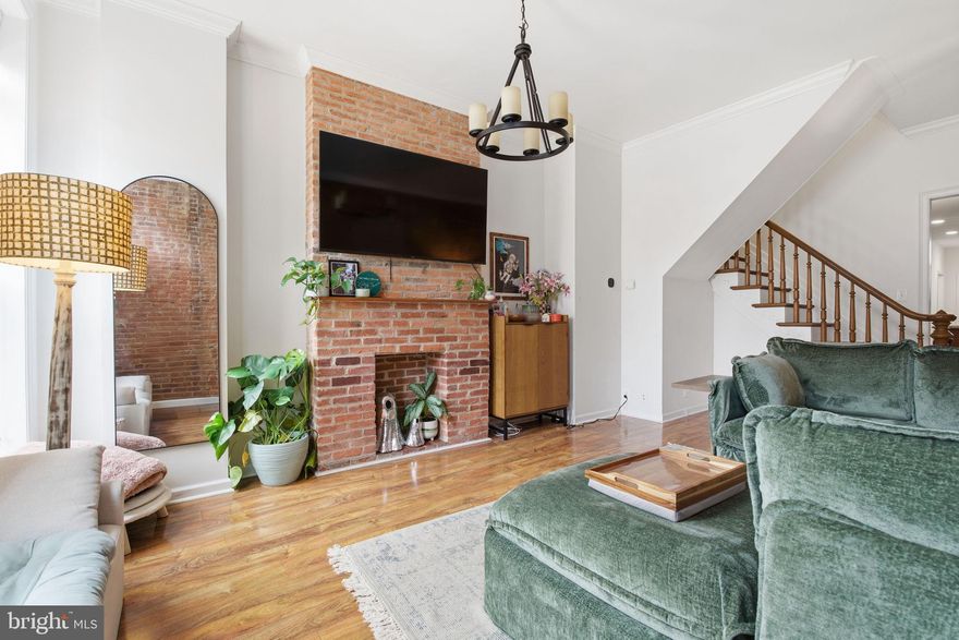 Welcome to 3032 Dillon, a beautifully maintained row home in the heart of Canton, priced to sell fast! Step into a spacious living room adorned with exposed brick and timeless original details. The adjacent dining area flows seamlessly into a kitchen boasting abundant counter space, perfect for hosting gatherings. Toward the rear, discover a conveniently placed half bath on the main level, plus a parking pad and gated side storage outside. Ascend the wide stairwell—designed to accommodate any furniture—to an expansive upstairs hallway with soaring ceilings. Discover two spacious bedrooms, two full baths, and direct access to a private roof deck, showcasing breathtaking 360-degree views. The versatile basement serves as an ideal second living space, gym, or third bedroom, with ample unfinished storage for all your needs. Centrally located to all of the restaurants/bars/etc. that Canton has to offer and a short walk away from Canton Waterfront Park and Patterson Park. Great homes like this one don't come around often, don't miss out!