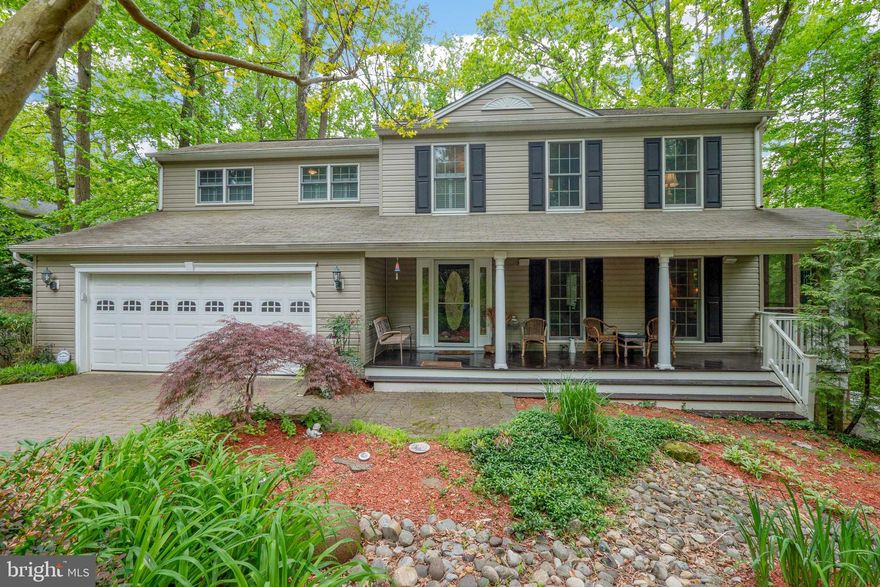 Highly sought after water privileged community of  Herald Harbor on the Severn !!! Beautiful Colonial with lovely brick pavers surrounding a lavash yard.  5 bedrooms, 3.5 baths, 2 car garage.  Fully finished lower level with in-law suite (kitchenette) Freshly painted ,granite countertops, family room off of kitchen with fireplace, vaulted ceilings and skylights, formal dining room and formal living room, eat in kitchen, screened deck of the back of the home overlooking private wooded yard, fully fenced back yard.  Lower level has a in law apartment or bedroom or offices.  Tons of storage!