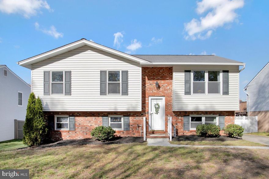 Celebrate the New Year in your new home!  You're going to love this instantly appealing home, both inside and out.  Come spring, escape to your screened porch,  featuring a cathedral ceiling that overlooks the level yard.  An adjoining deck and lower patio, along with the fenced yard, will provide wonderful space to enjoy warmer weather.  If you like entertaining, you'll find the open floor plan on the main level a fantastic place for friends and family to gather.  The kitchen which opens to the combined dining and living area, boasts lots of counter and cabinetry space.  Three bedroom and two full baths are just down the hallway. Retreat to the lower level when you are looking to unwind.  The huge family room has a sliding glass door that leads out to the patio.  On this level you'll also find a fourth bedroom, half bath and storage/laundry room.  A door and hallway separates this area from the family room, offering great privacy.  
Love the location-short walking distance to Quarterfield Elementary (newly built in 2023),  short driving distance to shopping, restaurants and retail (Sam's Club, Walmart, Lowes,  Kohls, Chic-Fil-A, The Grill at Quarterfield Station restaurant,  Aldi, LA Fitness and Severn Danza Park (sports fields, walking trails, tennis courts etc...)  Easy access to routes 97 and 100