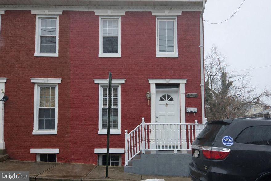 Prime investment opportunity in the heart of Hagerstown. This 2 bedroom, 2 bathroom twin home built in 1896 offers 1,140 finished square feet with classic brick exterior and off street parking. Small 0.09 acre lot provides low maintenance ownership. Basement offers additional storage and potential value add. Convenient location near amenities and commuter routes supports strong rental demand. Property currently generates $1,988.50 per month in rental income. Ideal for investors seeking cash flow or future appreciation. Buyer to verify all financials.