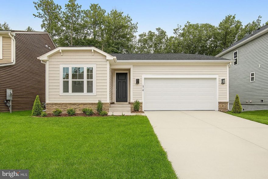 NEW Construction  - Ready to move in today! Below Market financing available. This  ranch-style model home includes an inviting great room with fireplace and a well-designed kitchen with stainless-steel appliances, tile backsplash, hardwood flooring, a built-in pantry and an adjacent dining room. The luxurious primary suite offers a roomy walk-in closet and lavish bath with double sinks. You'll also appreciate the private study, extended covered deck and unfinished basement. Lot backs to trees!