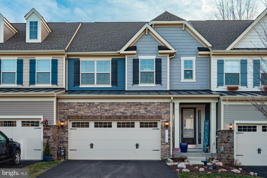 Stunning Henlopen II villa by KHovnanian built in 2021!! There are only a few of these in Brunswick Crossing. This floorplan gives you the feel of a single-family home in many ways: Fantastic open layout on the main level featuring LVP flooring throughout with a large kitchen and island which opens up to the huge family room and morning room.  The kitchen has quartz countertops and painted gray cabinets and upgraded stainless steel appliances including a gas cooktop and double wall ovens. You will be impressed by the size and quality of the 23x15 ft trex deck with stairs that the homeowners put on only a few months ago, situated right off the kitchen.  Enjoy the quiet and privacy of the wooded lot and a level backyard. Practical 2-car front loading garage with mudroom family entry and large pantry.  Take the stairs to the second level where you're greeted by a loft space, perfect as a second sitting room or playroom. The spacious primary suite sits in the back of the home with serene views of the trees outside. Both the loft and the primary feature LVP flooring. The bathroom has double sinks, a large soaking tub and shower. Huge walk-in closet! Two more large bedrooms, a full bath and large laundry room complete the second level.  The daylight basement has a finished rec room and full bath, and ample storage, all situated above ground with a sliding door out the yard to a temporarily fenced space under the deck for your pets. The backyard can be fenced of course, but whether it's fenced or not, the HOA fee covers mowing in the front and back of the home.  Come and see what Brunswick Crossing is all about! Resort-like amenities including swimming pool, tennis courts also featuring pickle ball lines, soccer field, walking trails for miles nestled throughout the community, a beautiful community center that you can rent for private events, dog parks, tot lots and more! Don't miss this beautiful home! Schedule your showing today.