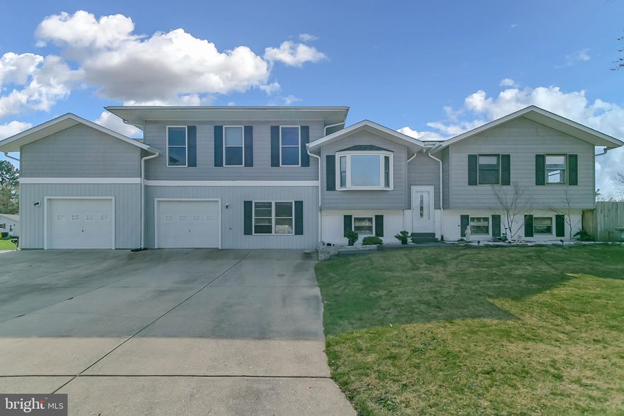 Welcome to this lovely, cozy home on double corner lot with many upgrades. 7 Bedrooms and 5 Full Bathrooms. Large MBR w/SPA. Freshly painted house. Upgraded Kitchen with Hood system. Renovated upper level Bathroom, Ceramic tile on Foyer. Fireplace on lower level. Enjoy early mornings sitting in your gorgeous Sun room with attached Deck. Huge Driveway that can fit up to 4 cars. Spacious car garage converted into Living/Rec/Ent Room with 14 ft. ceilings. Fully finished walk out Basement in lower level w/large Bed room, Full Bath and Laundry room; Beautiful 32X15 Swimming Pool is perfect for those wanting to keep in shape. No HOA....MUST SEE!!