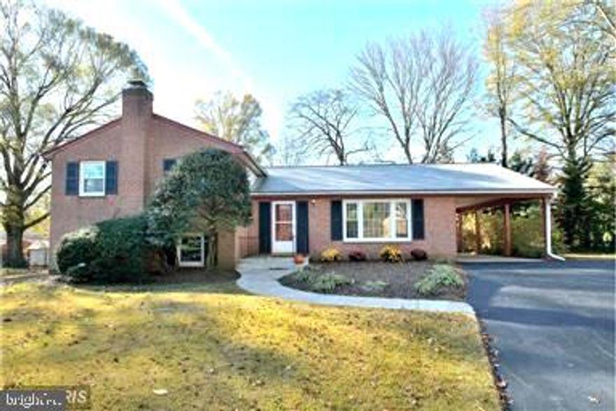 Beautiful brick home with large gourmet kitchen and garage. Hardwood floors and brand new carpeting. Double paned windows, garden level sundeck. 4 BR's and 2 FB's on upper level. Lower level features 5th BR and 3rd FB. Family room with gas fireplace. Additional large utility and storage area. Pictures are a representation as the home is occupied. No more than 2 incomes to qualify.