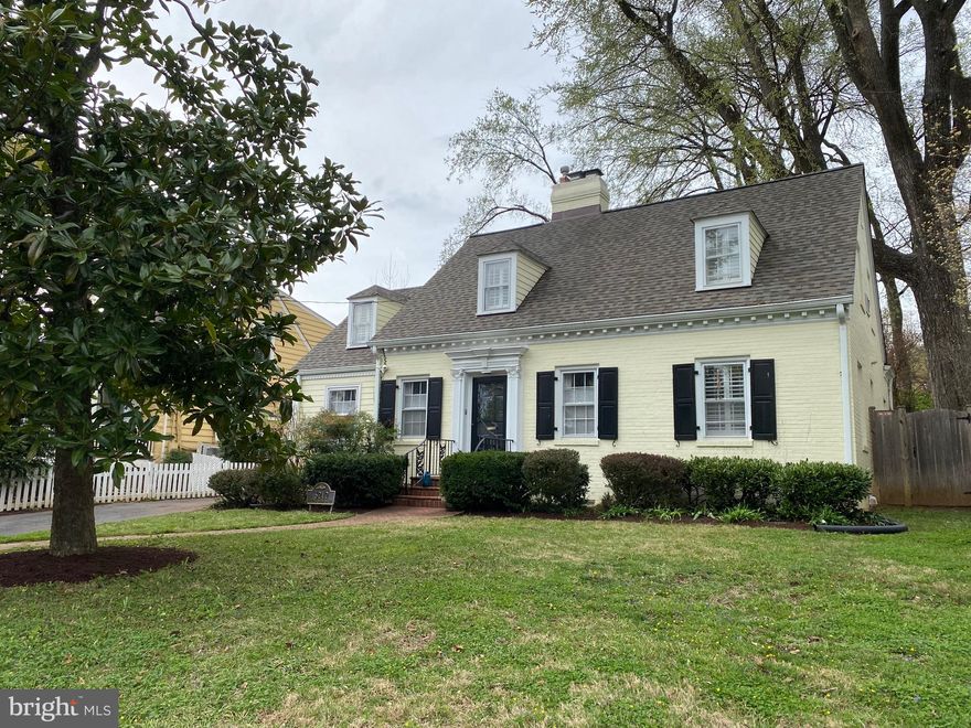 Stunning 1939 Williamsburg Cape Cod with wide plank pine floors, custom built-ins and Dentil crown molding  in the living and dining room,  a magnificent fenced rear yard with expansive flagstone patio and outdoor fireplace located in the quiet but convenient Bethesda neighborhood of Fairway Hills. Light filled and professional landscaped lot, this 4 bedroom, 3 full bath home has an upper level primary suite that includes a large bedroom, full bath, sunny window seats, great storage, a sitting room with fireplace and additional office or nursery space. The beautiful kitchen with breakfast bar opens to the sunlit family room with a view of the gorgeous private patio through a wall of windows. There are two additional bedrooms and full bath on the main level, one which can comfortably fit a king size bed along with a large living room with fireplace, separate dining room and expanded kitchen with stainless appliances and custom cabinetry. The lower level has a full bath and would make a great guest suite, office  space or play room. Walk to Glen Echo Park, the C&O Canal, shops and EZ commute to Bethesda, DC & Virginia. Whitman Schools!