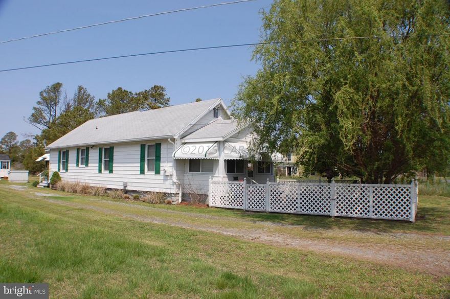Just right for that 2nd home and 100 yards from boat ramp in the Bay side town of Crisfield. Cute bungalow offer many updates including recent Heat and Air. Fantastic condition this home is turn key! Plenty of room for the boat and the rest of the toys at 1.8 acres.