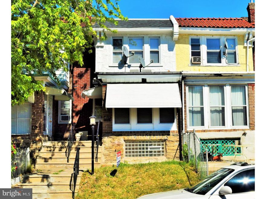 Just finished this beautiful completely rehabbed home located in the East Oak Lane section of Philadelphia on a tree lined quiet neighborhood.  Check out the front lawn with a patio and awning covers on new windows. New doors and screened entrance into the enclosed porch which is really like Living since it is a straight thru open floor plan. newly finished original hardwood floors shining like new money. Living room recessed lightning & gas fireplace. dinning room with recessed lightning & chandelier. exquisitely finished new eat=in kitchen with granite countertenor, ceramic tile floor, stainless steel refrigerator, dish washer, gas stove, and microwave & deep stainless sink. traditional color new L-shape cabinetry. exit kitchen to a wrap-around deck. brick rear exterior.  Completely refinished basement with a 1/2 bath. use as family/rec room. extra closets, & laundry room area. exit basement to back fenced yard, a garage & additional off-street parking. 2nd floor has 3 new bedrooms all hardwood flrs, all finished. master bedroom w/lots of closets, newly completed hall full size bath with new pieces, and ceramic tiled floor. 100 amp electric breakers, gas cooking and heating, lots more to see...