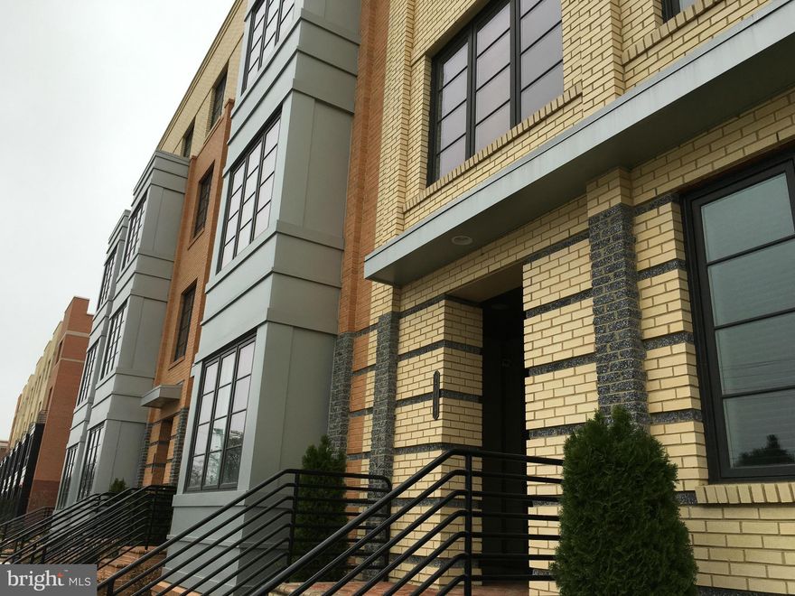 Potomac Yard - REDUCED _you REALLY NEED TO SEE THIS ONE. Don't dismiss it for being on Jeff Davis, this is new construction with double pane windows. Area across street has been rezoned. This large 3 bed plus 2.5 bath townhome/condo includes garage, balcony and all of the upgrades offered by the builder at this incredible price. Own now and enjoy Urban Living,