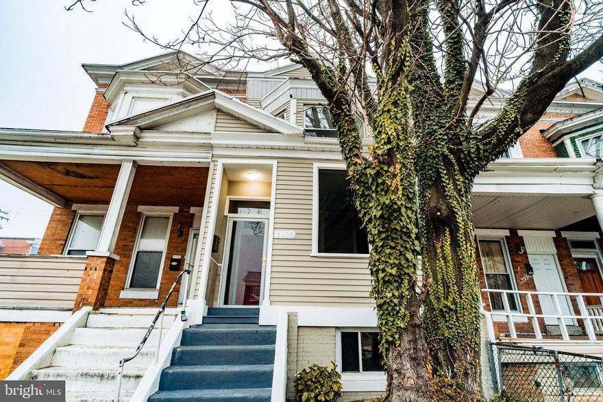 BACK ON THE MARKET AND REDUCED! Priced to sell.  Very spacious 3 bed 2 full bath with a front porch sun room and much more!!  Upgraded kitchen with granite counter tops and tile floor.  All the formal areas, double deck and much more.  The basement can be used for much storage space or finished for additional income.  Convenient to Shopping, minutes from 40 and many amenities. Call today for a showing!