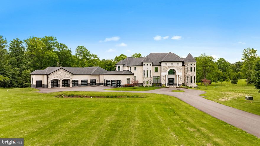 $100k PRICE IMPROVEMENT to sell quickly! Offer deadline: Friday, June 13th at 6PM.

Experience resort-style living in this exceptional 7BR, 8/3BA estate on 5.13 acres, custom built by award-winning Bethel Regency Homes in 2021. This luxury home features an elevator, saltwater pool, indoor sport court, gym, wine room, and 8-car garage. The show-stopping kitchen with backlit onyx island opens to a coffered-ceiling family room. Upstairs, the lavish primary suite boasts dual dressing rooms, a sitting area with fireplace, and spa-like bath. The walk-out lower level offers a rec room, wet bar, game room, and additional bedroom suites. This is refined, resort-style living at its best.